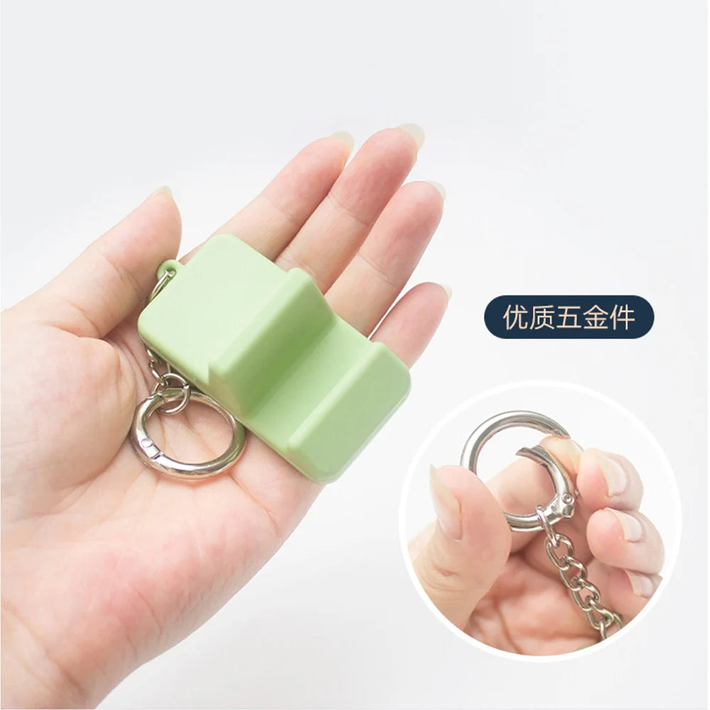 Mini Silicone Phone Stand Keychain – Portable Travel Desk Holder