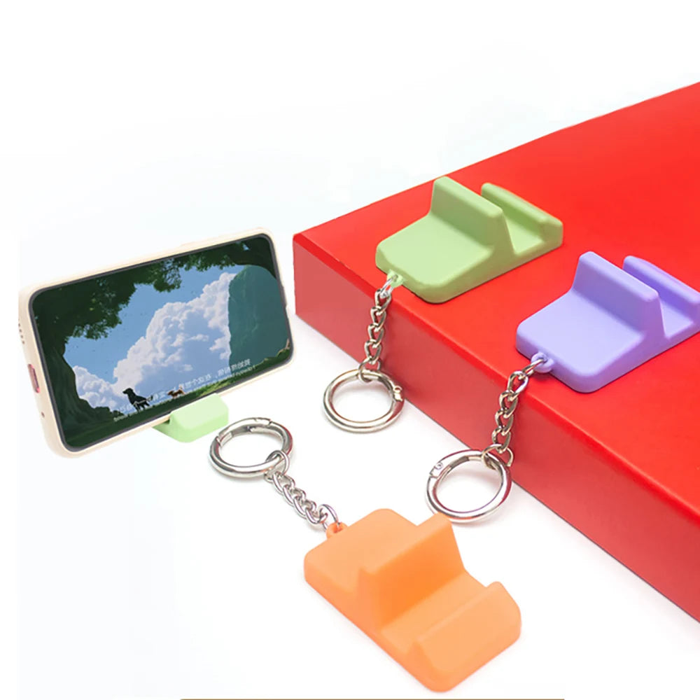 Mini Silicone Phone Stand Keychain – Portable Travel Desk Holder