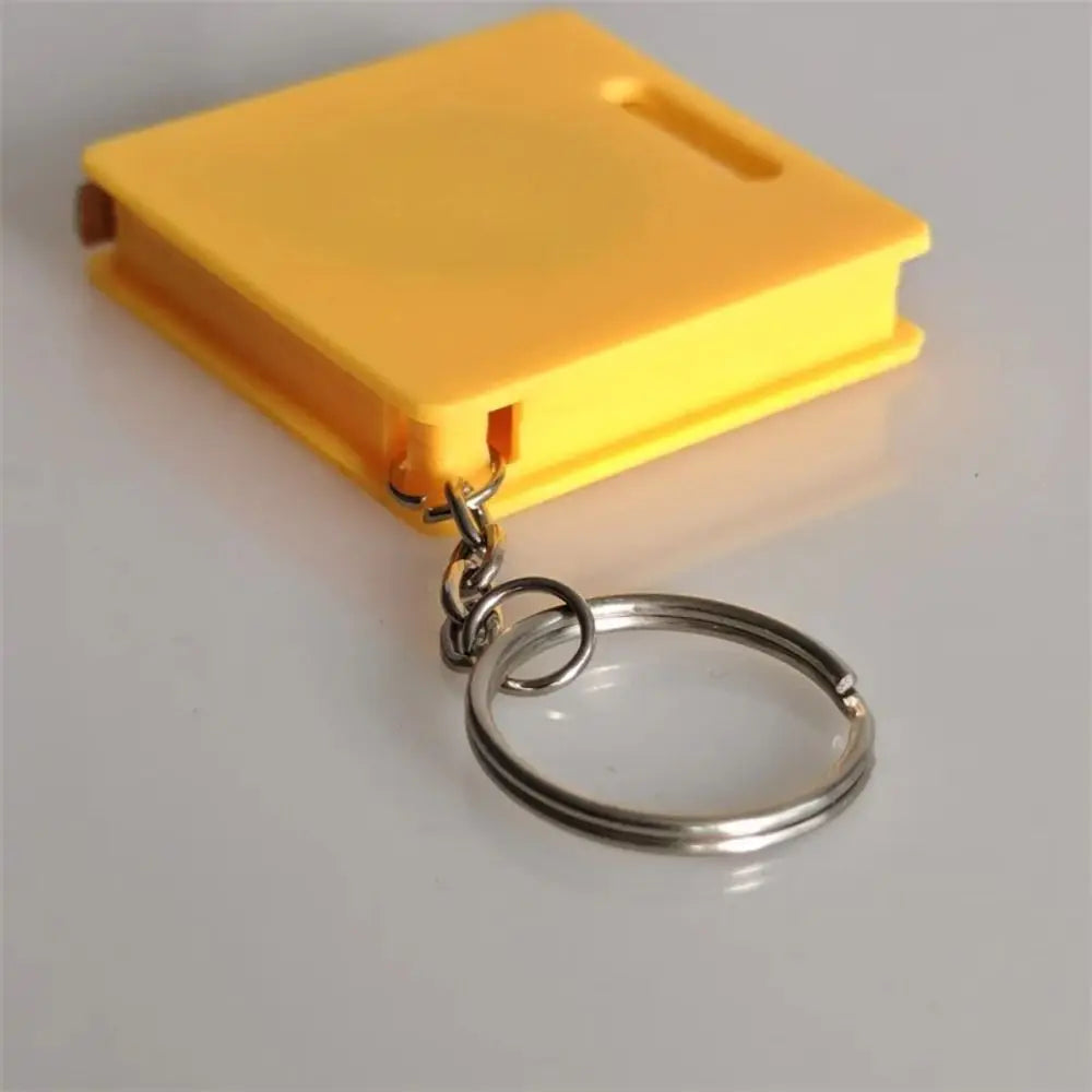 Mini Retractable Tape Measure Keychain – 1.5M Pocket Ruler
